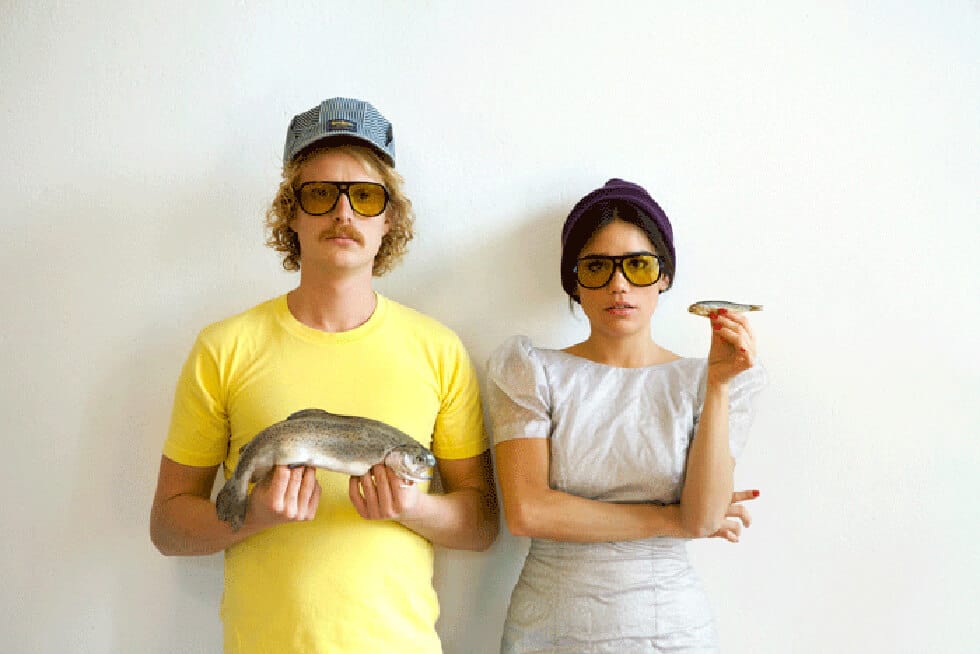Photo de couple portant des Mykita, lunettes de soleil d'exception